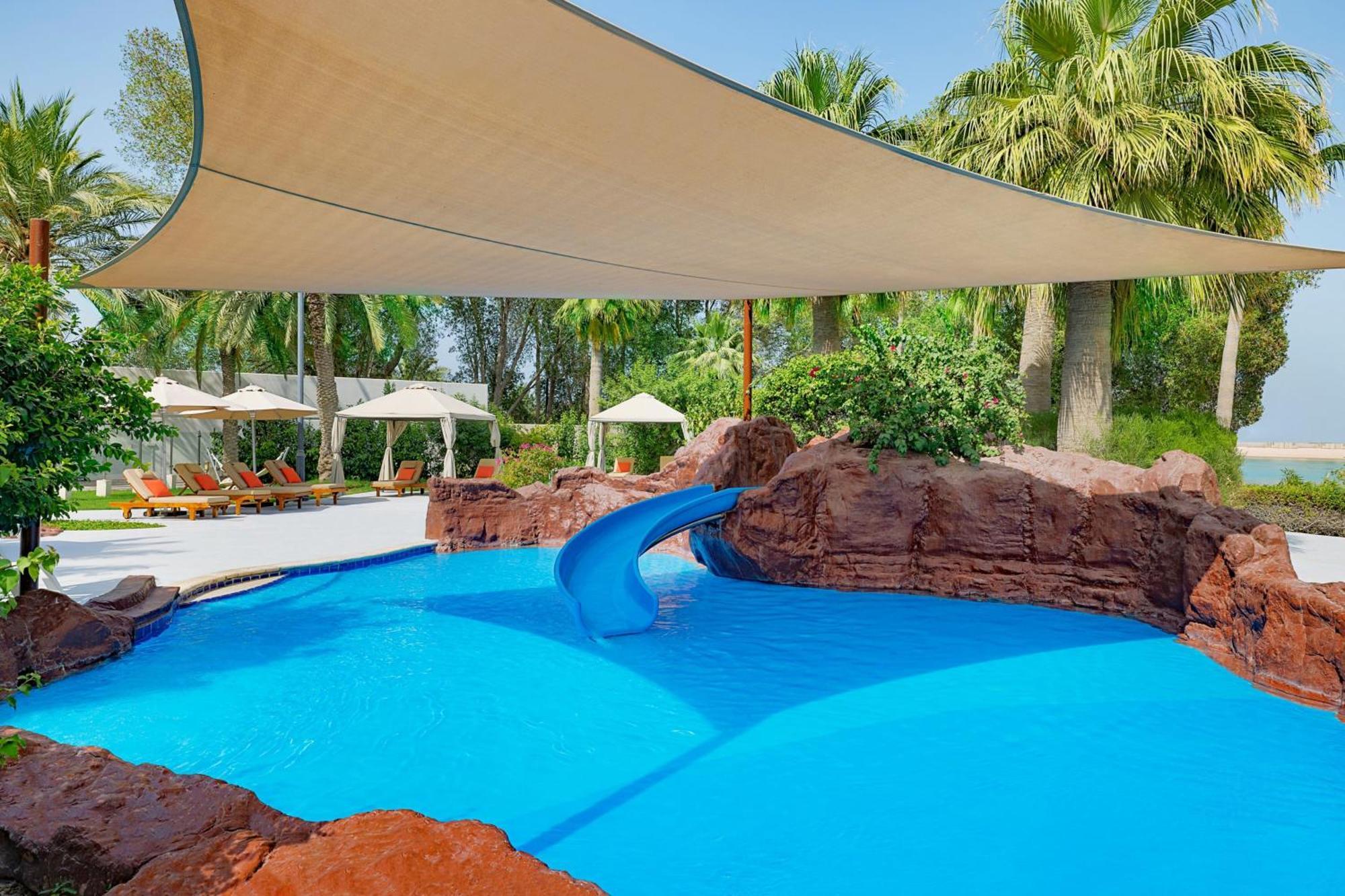 מלון The Ritz-Carlton, דוחה מראה חיצוני תמונה Shade sail over a pool